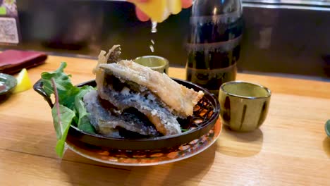 delicious fried fish served with greens and drink