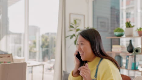 Phone-call,-talking-and-woman-on-sofa-in-home