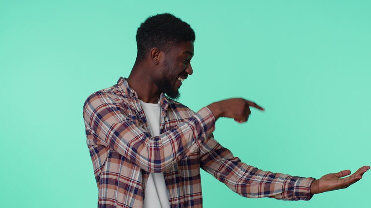 Man pointing empty place, advertising area for commercial text, copy space for goods promotion