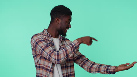 man pointing empty place, advertising area for commercial text, copy space for goods promotion