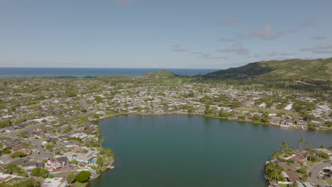 Aerial-panoramic-view-of-Kailua-neighborhood-and-Ka'elepulu-pond-on-the-island-of-Oahu-in-Hawaii-on-a-beautiful-day