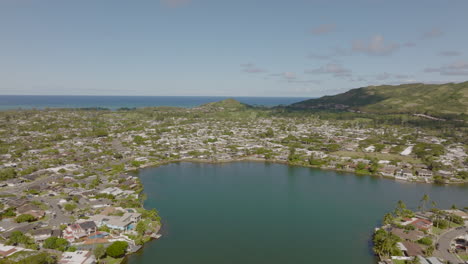 aerial panoramic view of kailua neighborhood and ka'elepulu pond on the island of oahu in hawaii on a beautiful day