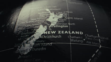 close-up map of new zealand on a globe