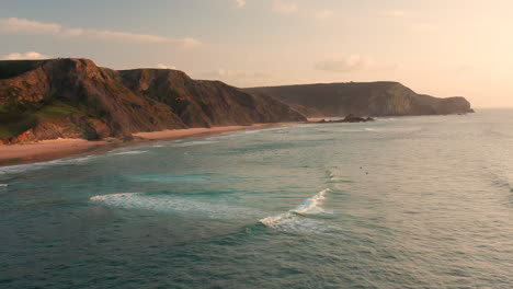 Aerial:-The-surf-beaches-of-Cordoama-and-Castelejo-in-the-Algarve,-Portugal