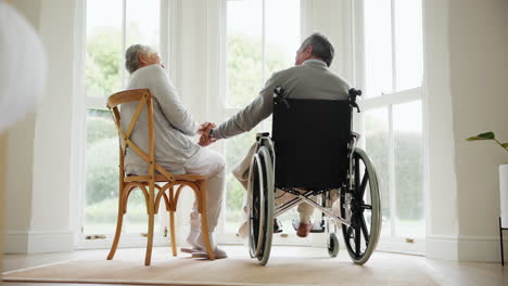 wheelchair, senior couple and conversation