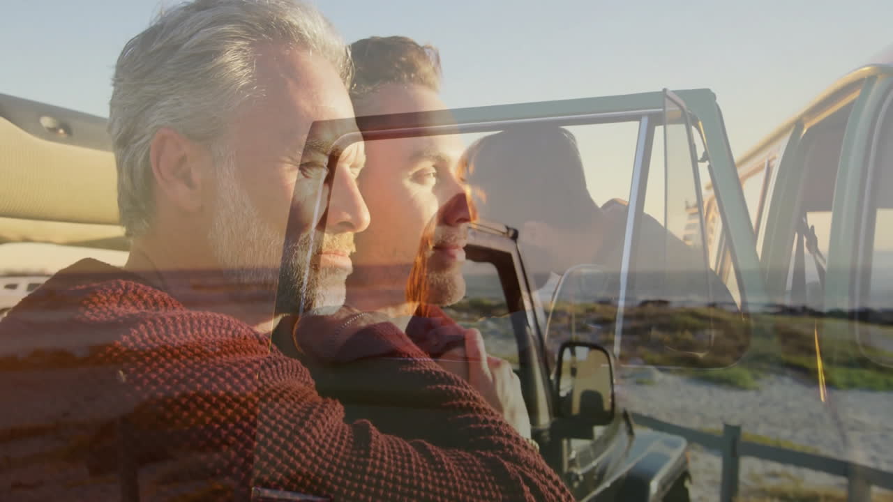 Gray-haired man in open-top vehicle appreciating scenic view, feeling relaxed
