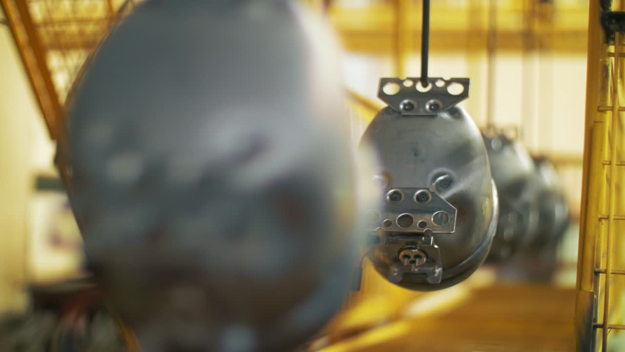 Finished electrical devices moving on conveyor line at manufacturing factory