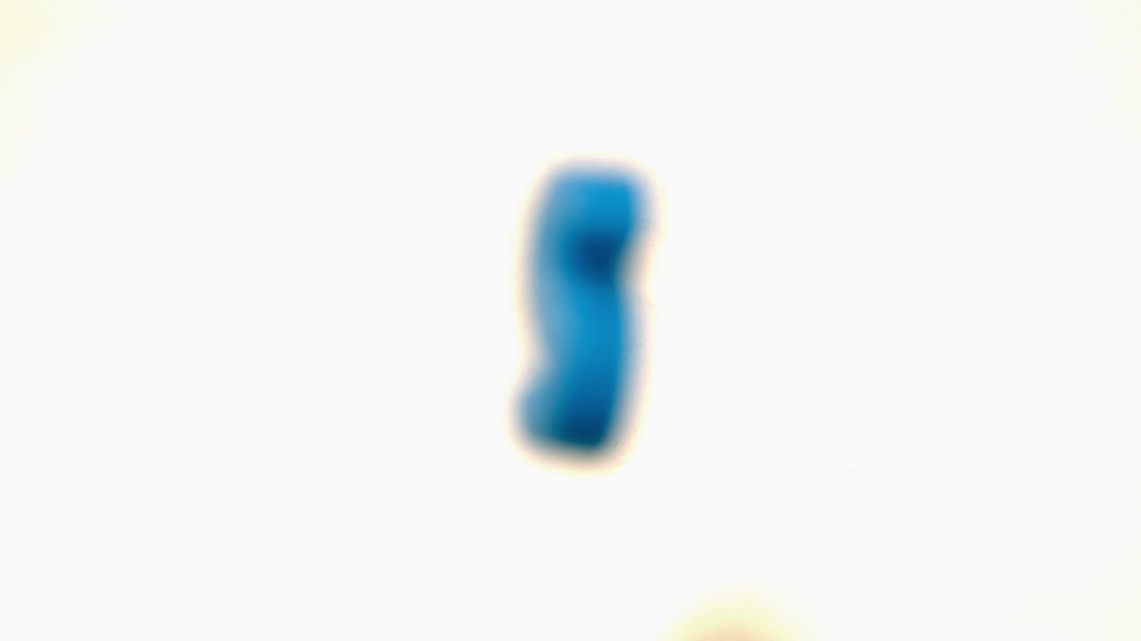 Blue letter s lifting off white background