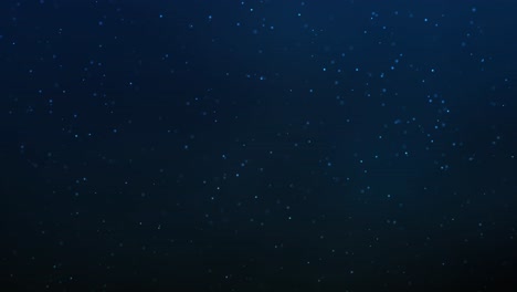 dark blue abstract glitter background - glimmering universe: sparkling stardust on a midnight sky