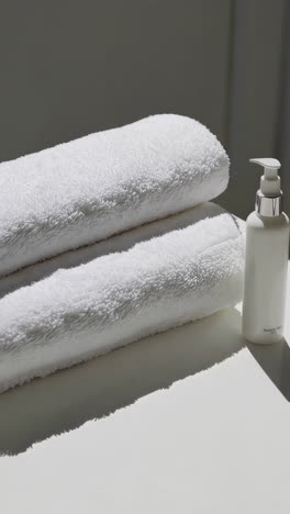 white towels and lotion