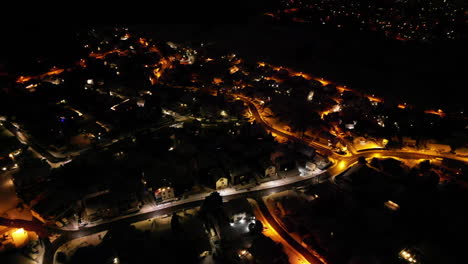 Aerial-of-neighborhood-lights-at-night,-Zurich-Switzerland