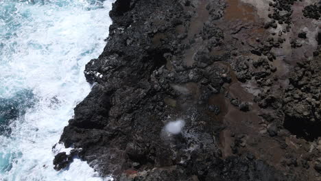 ocean water eruption, nakalele blowhole aerial top view, maui, hawaii