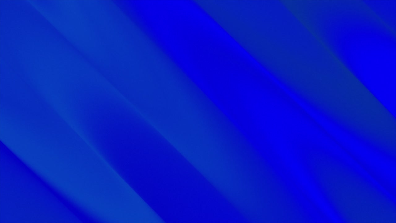 This calming animation presents varying shades of blue wavy patterns drifting diagonally across the screen, creating a serene, ocean-inspired background.