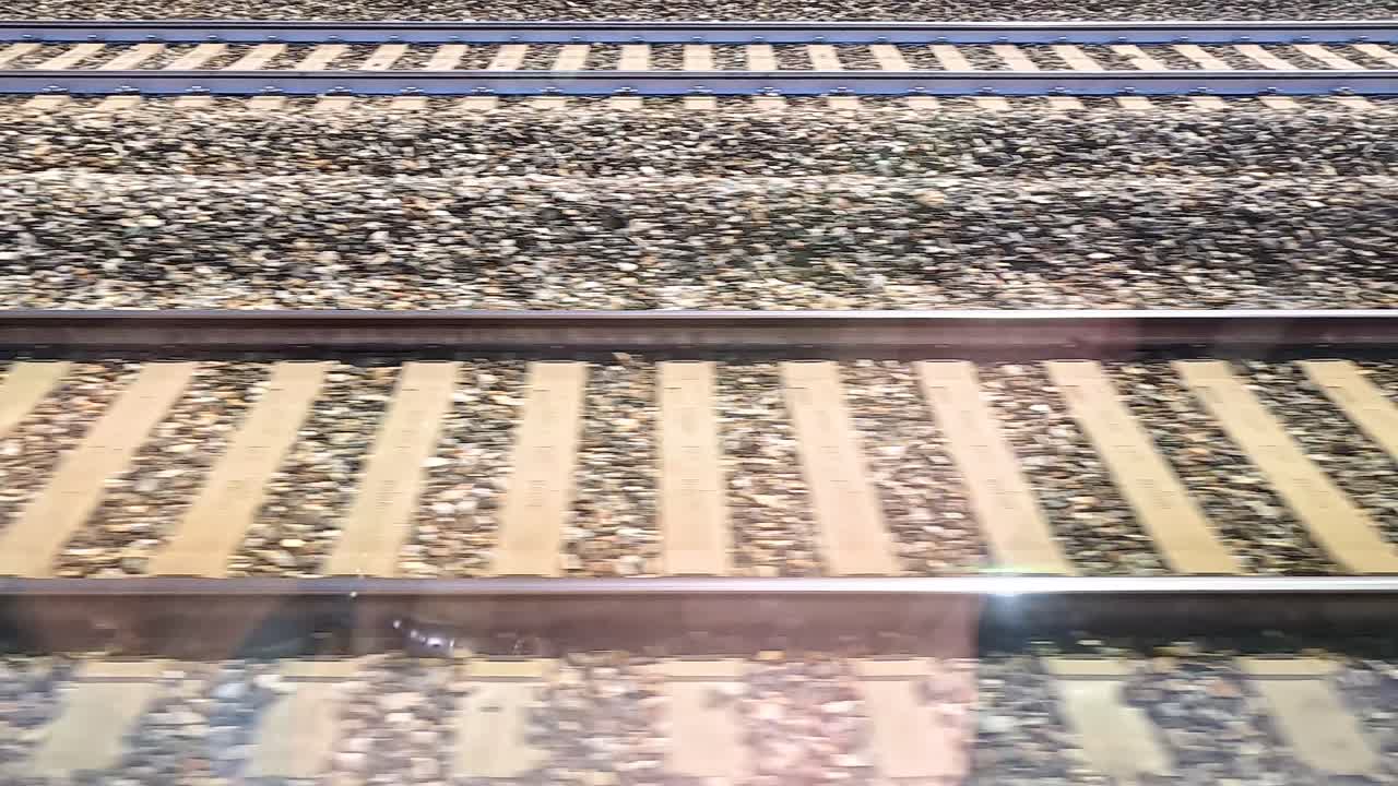 Train moving over tracks in Milan, Italy