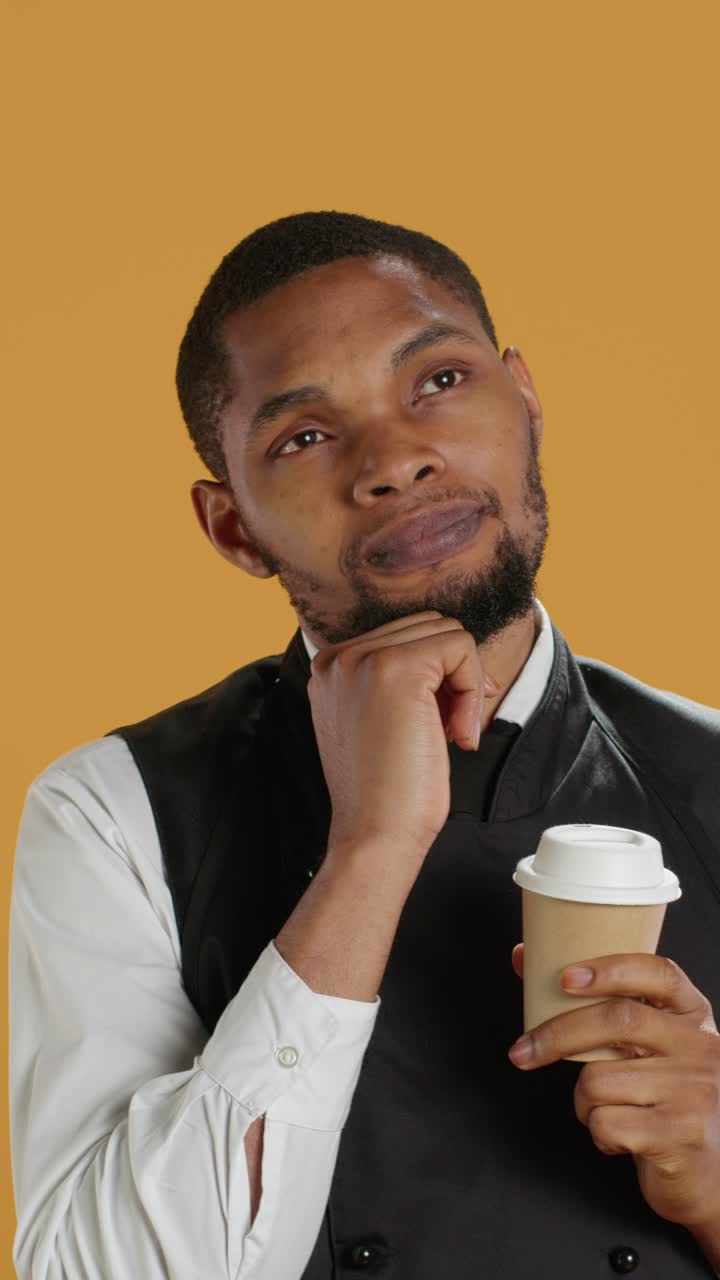 African American Man Drinking Coffee and Thinking