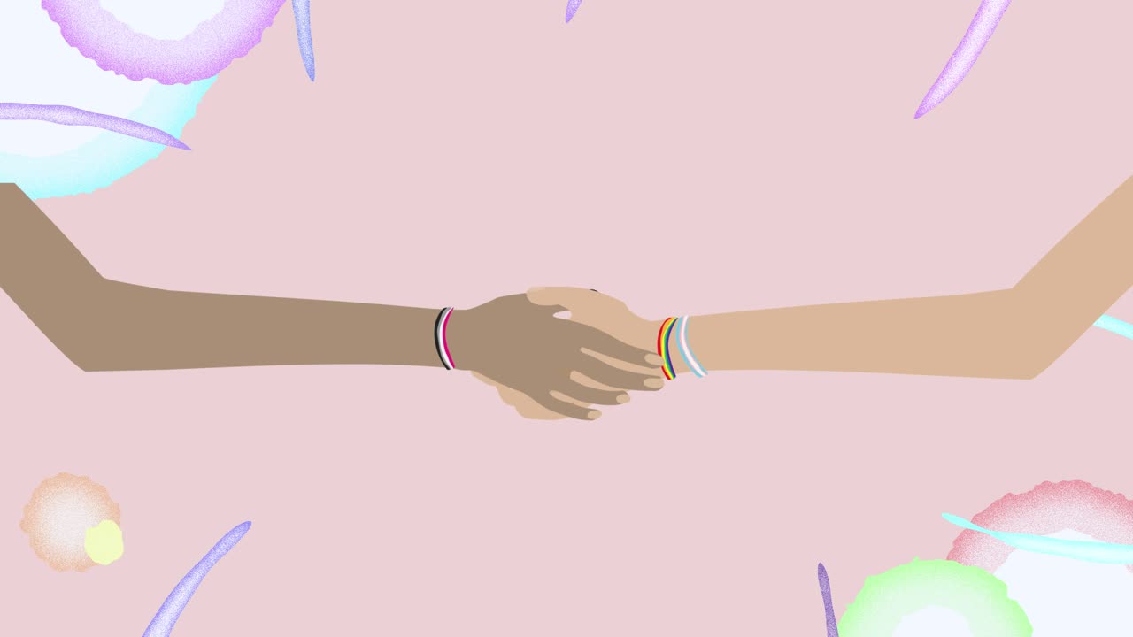 Two people with lgbt, bisexual and transgender bracelets shaking hands