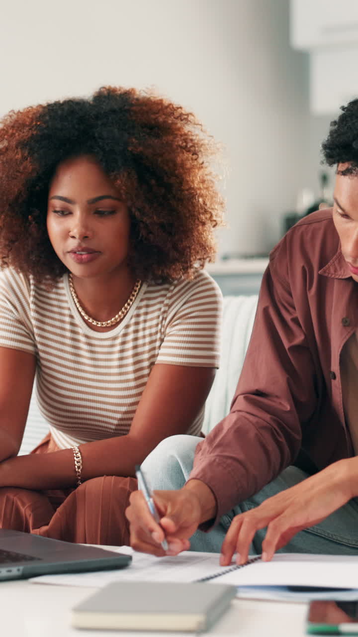 Young Black Couple Studying Together at Home with Laptop