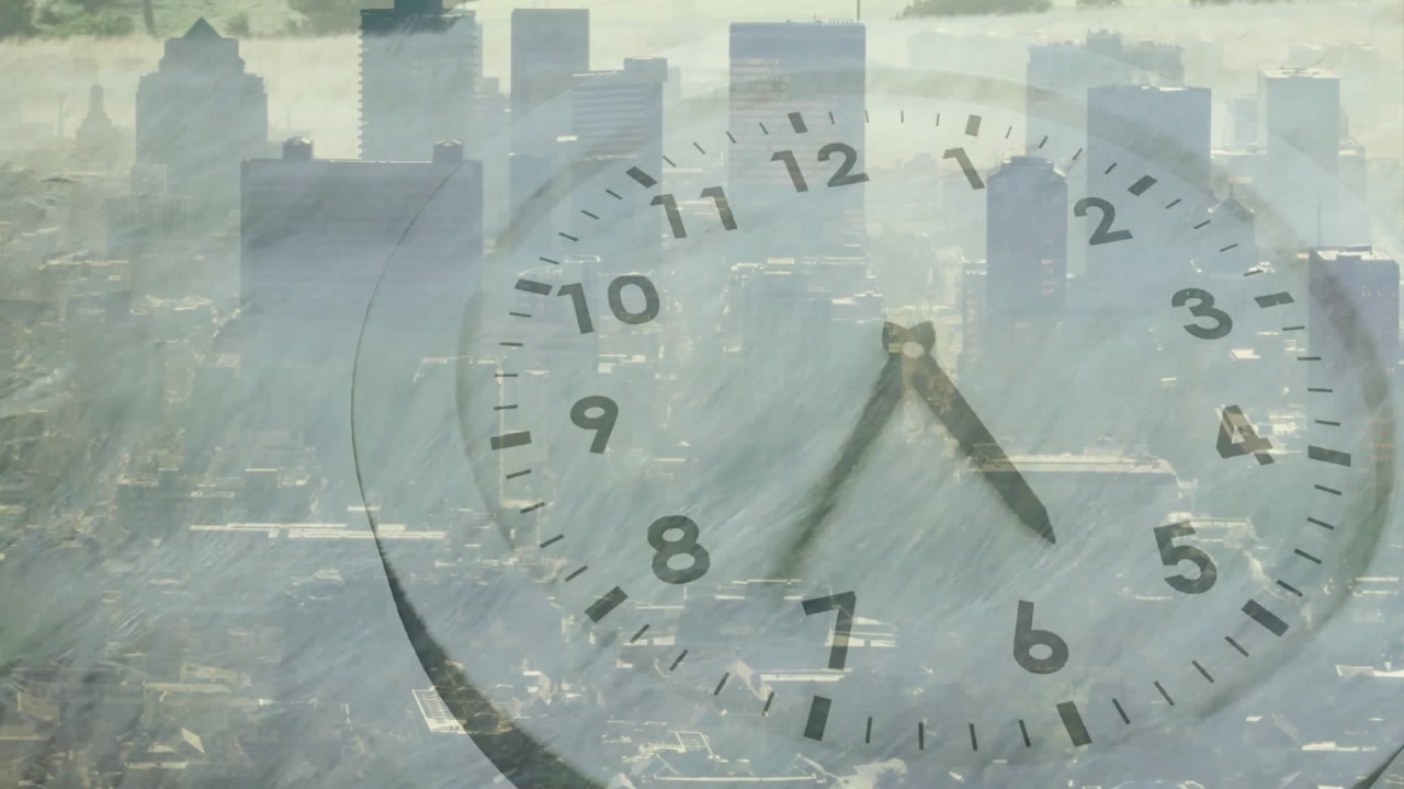 On start minute hand sweeping, hour hand advancing over hazy skyline showing time passage