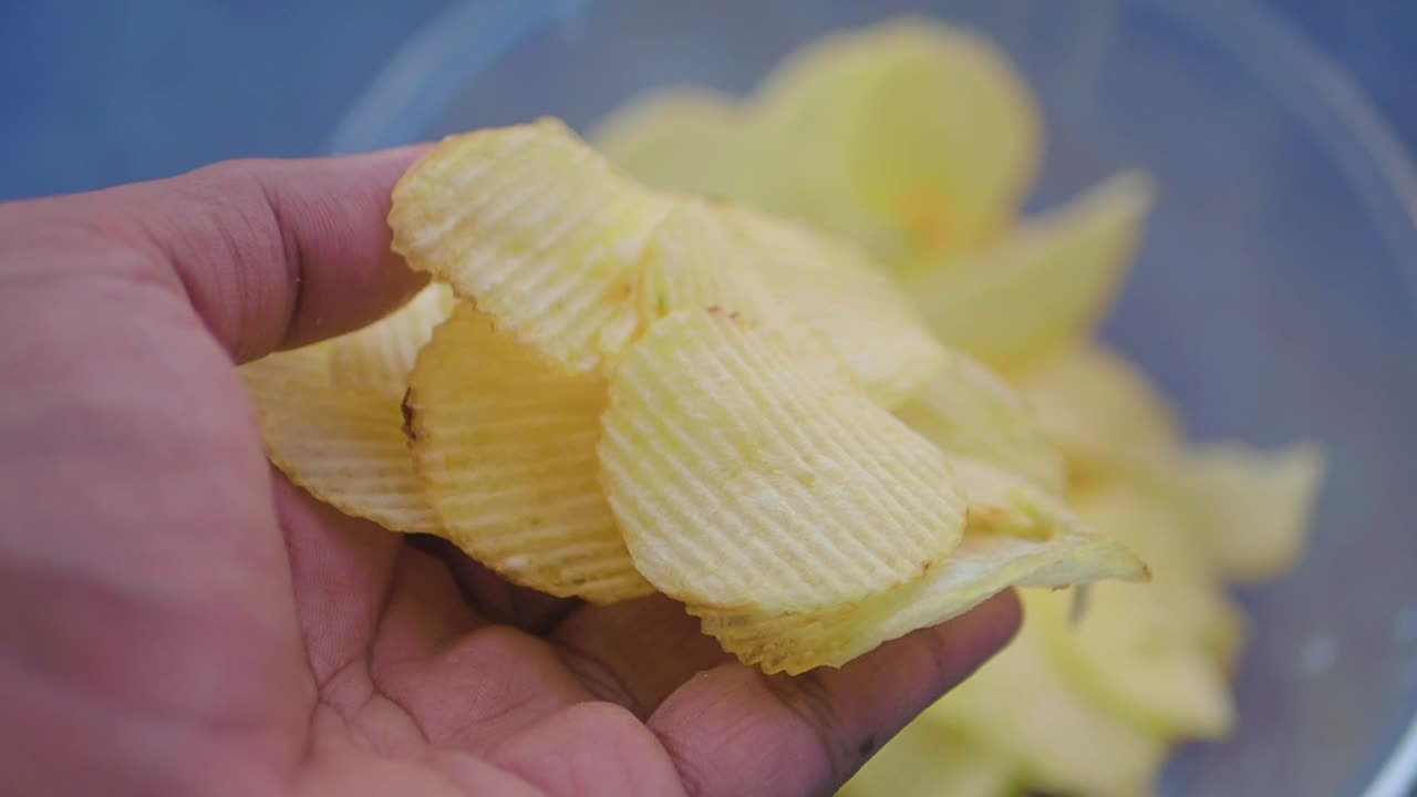Handful of Potato Chips