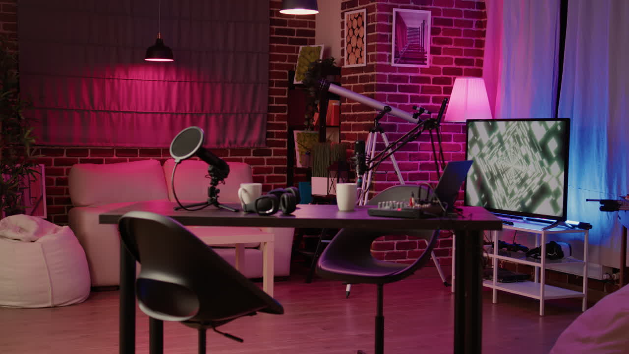 Nobody at empty desk with streaming equipment to broadcast live interview on social media