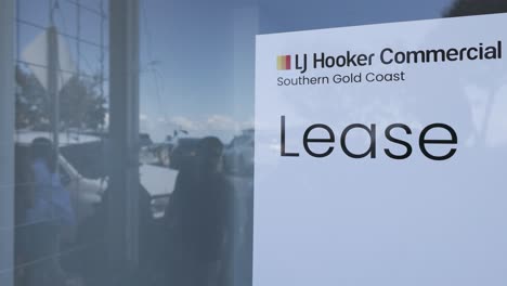 lease sign on window at currumbin beach