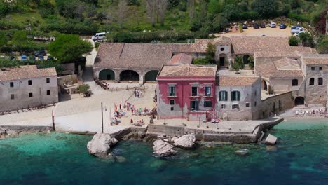 Beautiful-Drone-View-Above-Tonnara-di-Scopello-on-Rocky-Mediterranean-Coast