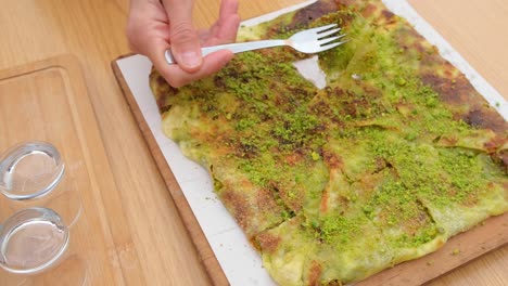 traditional gaziantep dessert katmer with pistachio powder, turkey
