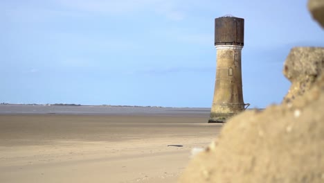 tower in the middle of the sand