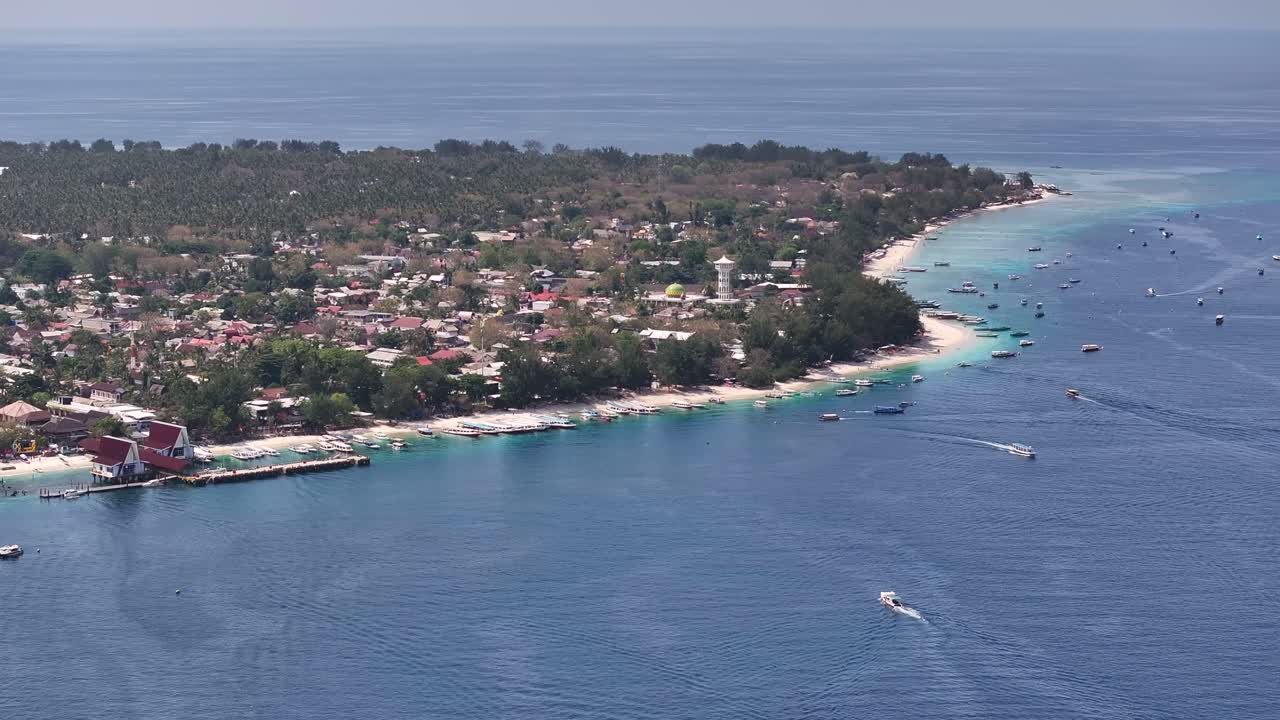 Picturesque shore of Gili Trawangan Island in Indonesia. Famous holiday destination. Aerial