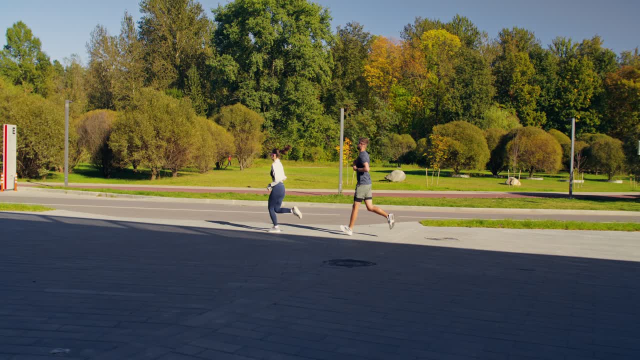 Couple jogging together in a park