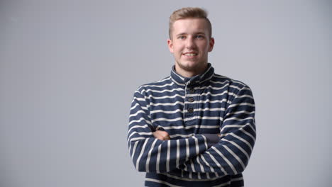 slow motion sequence of casually dressed man in studio