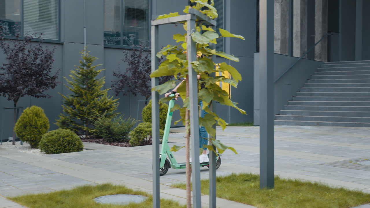 Woman Delivery Person on Electric Scooter