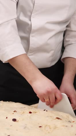 chef preparing cranberry bread