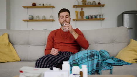 sick man sitting in the living room