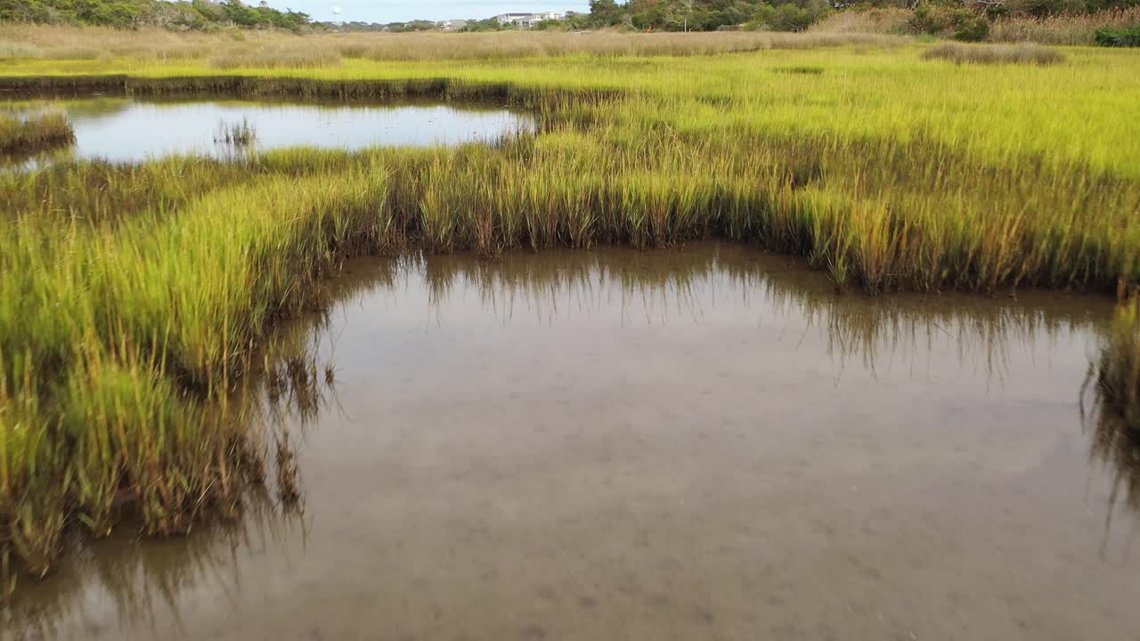 Flying low over the marsh at Oak Island North Carolina