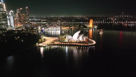 sydney opera house, drone night with lights. amazing view of cityscape, metropolitan city.