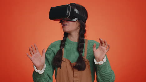 Young-woman-using-virtual-reality-headset-helmet-to-play-simulation-game-app,-watching-video-content