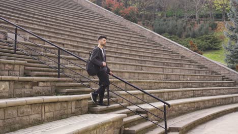 Lonely-young-man-walking-alone-outdoors.