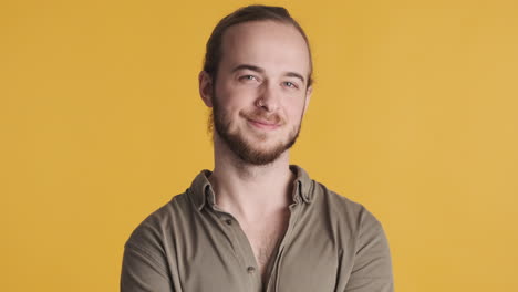 Caucasian-young-man-smiling-at-the-camera.