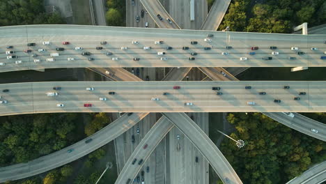 bird's eye zenithal satellite view of complex highway intersection exchange at sunset