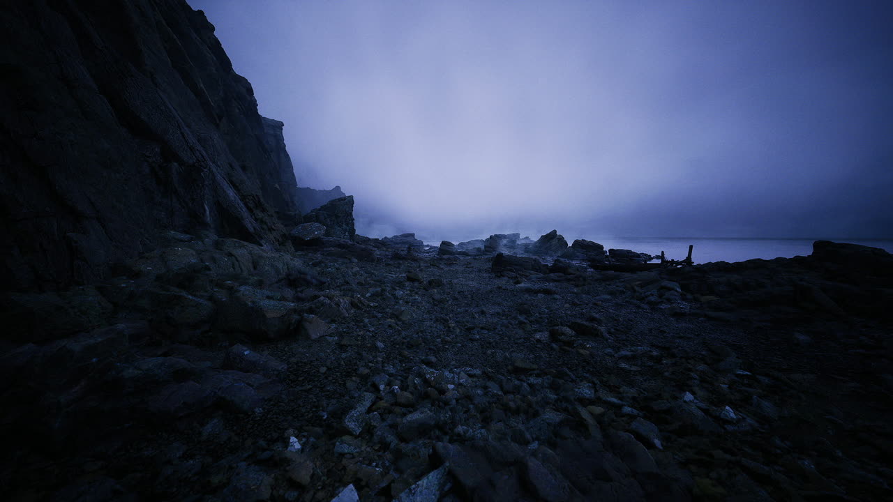 Quiet trail running beside ocean with scenic rock formations