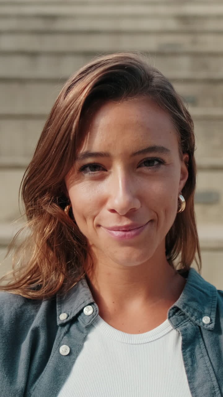 Portrait of pretty European girl, female student with blured background. Zoom