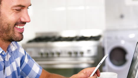 Close-up-man-smiling-and-using-smartphone