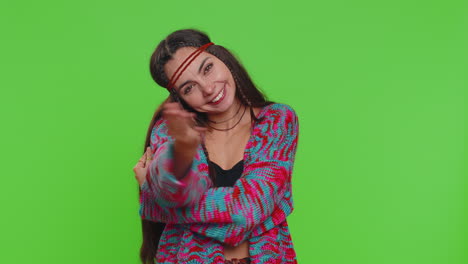 Young-happy-hippie-woman-girl-spread-hands-and-give-hug-embrace-to-you-on-chroma-key-background