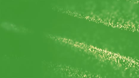 abstract green background with moving particles