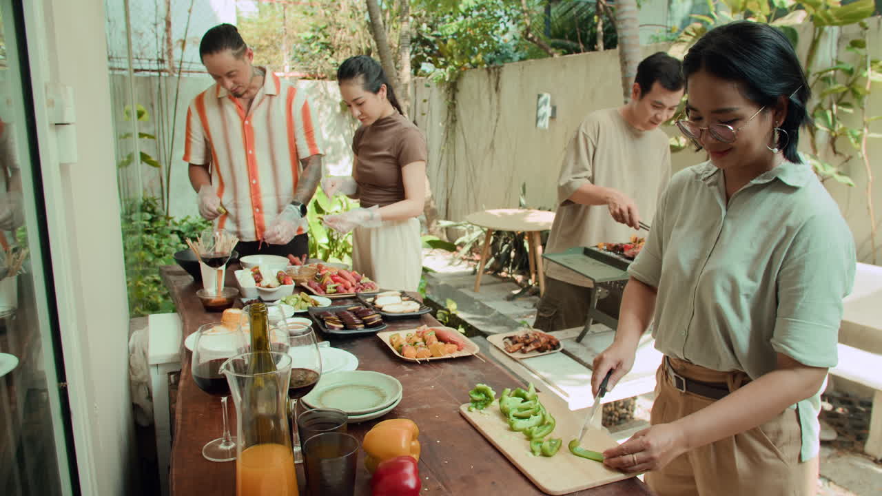 Four Diverse Friends Preparing Barbecue and Chatting at Backyard