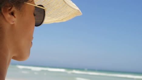 Close-up-of-woman-looking-at-view-on-the-beach-4k