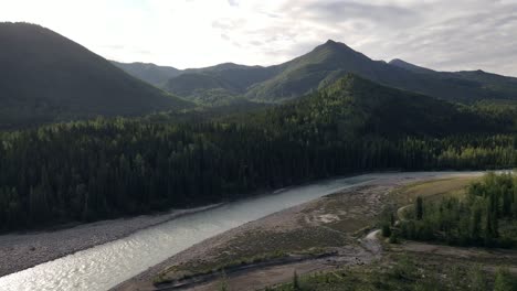 scenic and cinematic short 4k footage of toad river flowing through the idyllic landscape of northern british columbia in canada