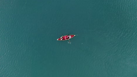 couple kayaking on a calm lake