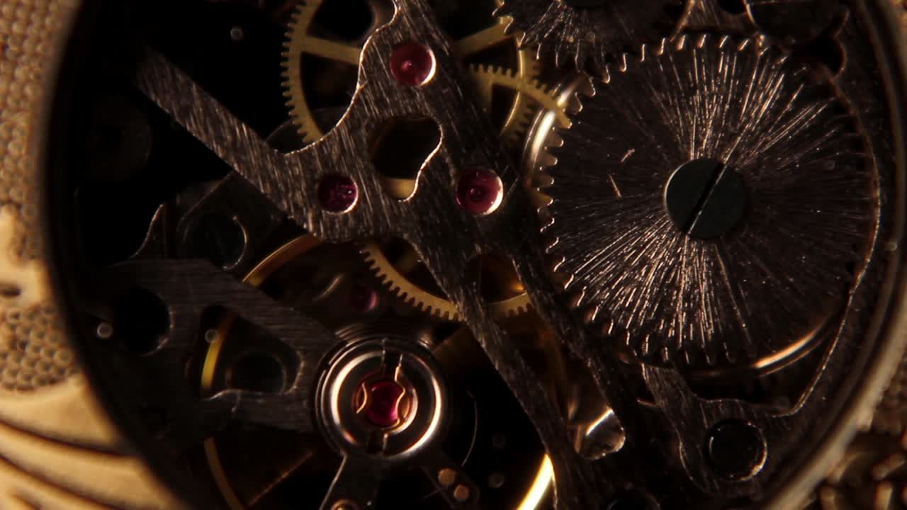 Close-up of Intricate Clock Mechanism with Moving Gears